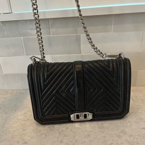 Gently used Rebecca minkoff black quilted bag! Great condition!